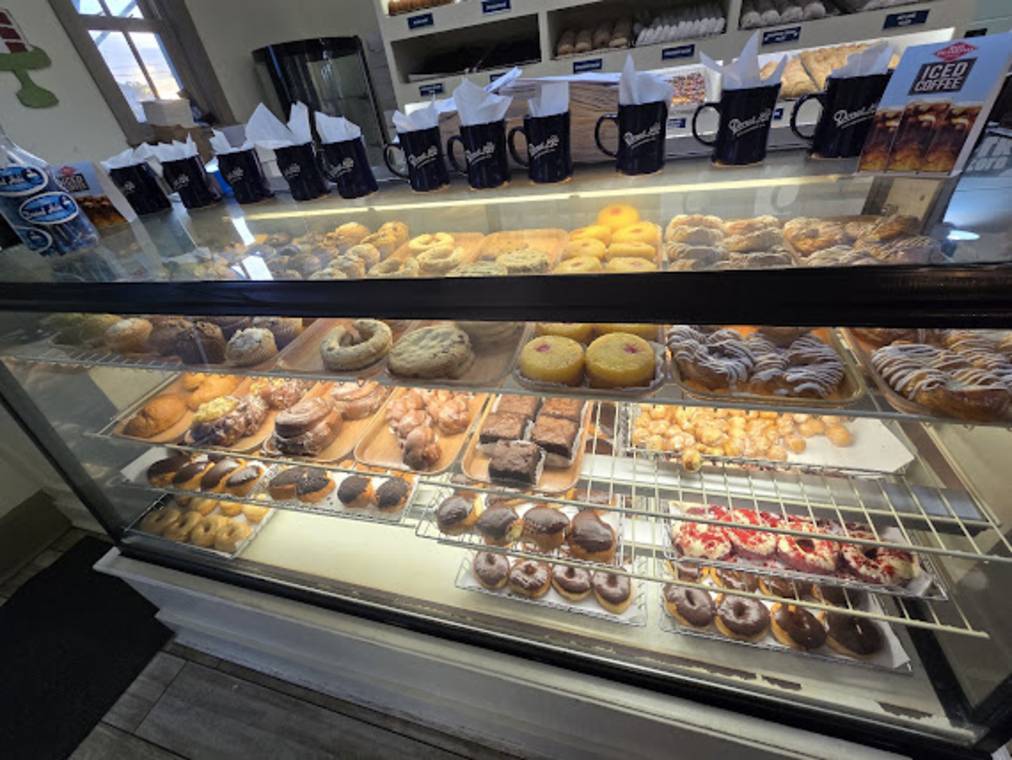 Trays of fresh donuts at The Donut Hole in Inlet Beach